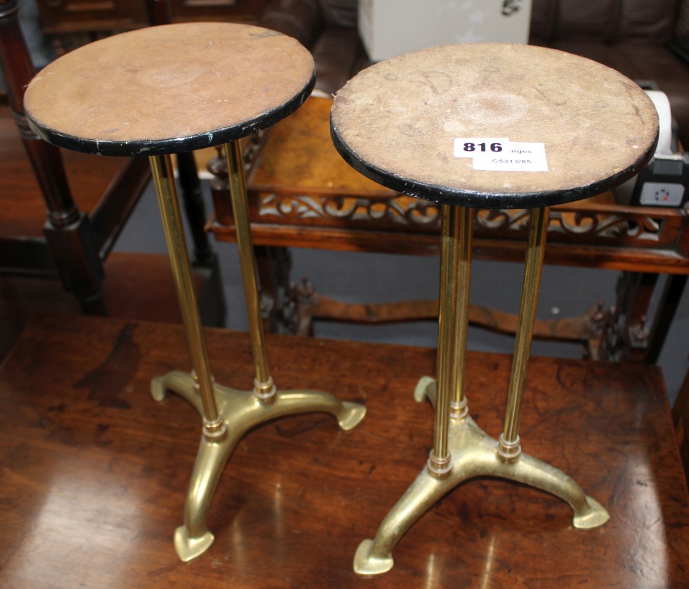 A pair of Edwardian brass stands, now with steel tops, Diam. 20cm H.40cm